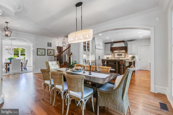 Chandelier, Dining room, Interior, Kitchen, Pendant Lights, Recessed Lighting, Stainless Steel Appliances, Wood Texture Flooring