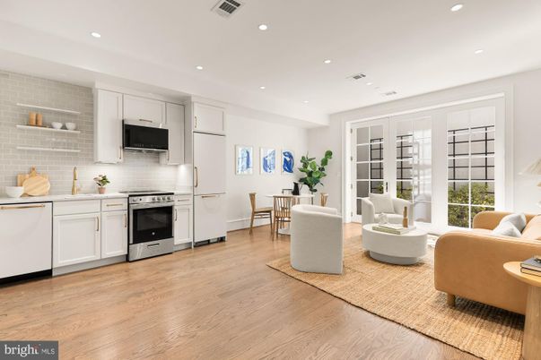 Dining room, Interior, Kitchen, Living room, Recessed Lighting, Stainless Steel Appliances, Stone Walls, Wood Texture Flooring