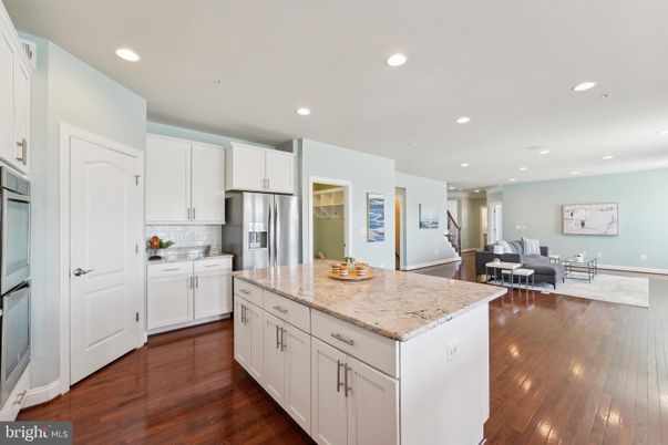 Dining room, Interior, Kitchen, Living room, Recessed Lighting, Stainless Steel Appliances, Wood Texture Flooring