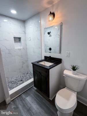 Bathroom, Interior, Marble Walls, Recessed Lighting, Wood Texture Flooring