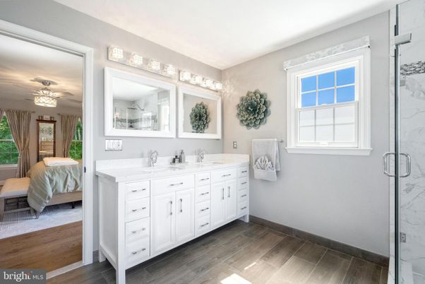 Bathroom, Bedroom, Dual Sink Vanities, Glass Shower, Interior, Marble Walls, Wood Texture Flooring