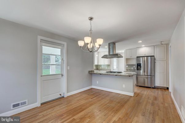 Chandelier, Interior, Kitchen, Pendant Lights, Recessed Lighting, Stainless Steel Appliances, Wood Texture Flooring