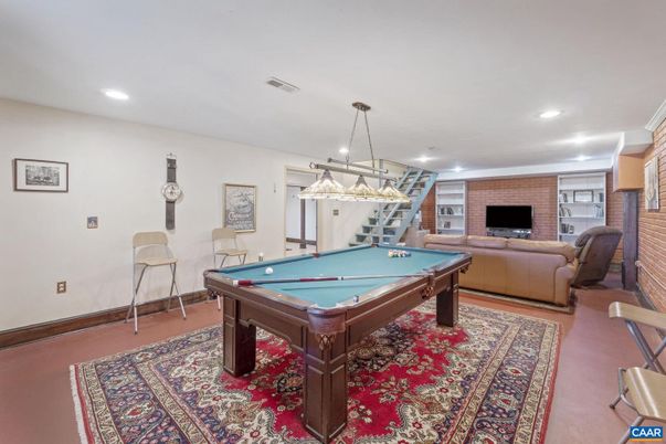 Billiard Table, Fireplace, Game Room, Interior, Pendant Lights, Recessed Lighting, Stone Walls