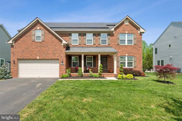 Attached, Exterior, Facade, Brick Facade, Solar Panels, Brick Traditional