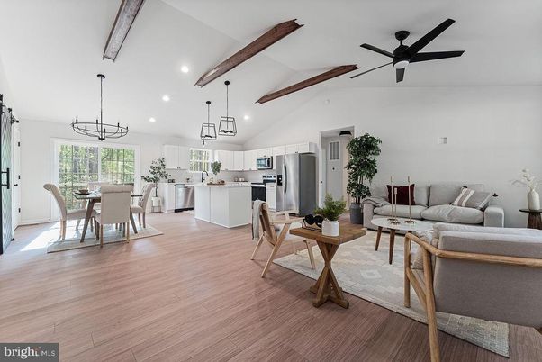 Dining room, Interior, Kitchen, Living room, Pendant Lights, Recessed Lighting, Stainless Steel Appliances, Wooden Beams, Wood Texture Flooring