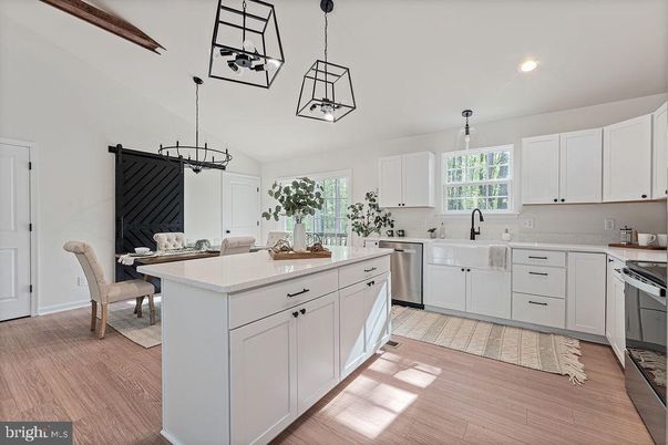 Dining room, Interior, Kitchen, Pendant Lights, Recessed Lighting, Stainless Steel Appliances, Wood Texture Flooring