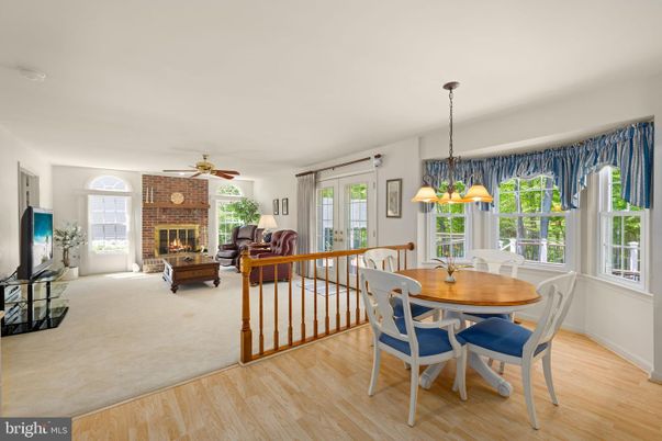 Dining room, Fireplace, Interior, Living room, Pendant Lights, Stone Walls, Wood Texture Flooring