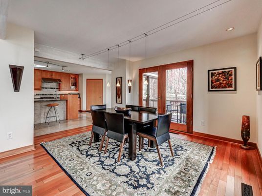Dining room, Interior, Kitchen, Pendant Lights, Recessed Lighting, Stainless Steel Appliances, Wood Texture Flooring