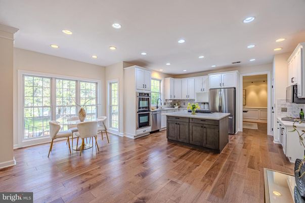 Dining room, Interior, Kitchen, Recessed Lighting, Stainless Steel Appliances, Wood Texture Flooring