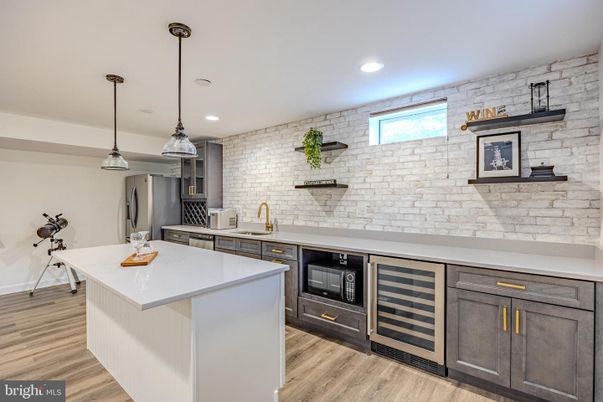 Interior, Kitchen, Pendant Lights, Recessed Lighting, Stainless Steel Appliances, Stone Walls, Wood Texture Flooring