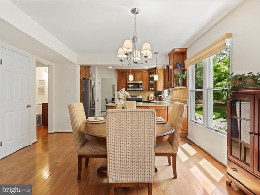 Chandelier, Dining room, Interior, Kitchen, Recessed Lighting, Stainless Steel Appliances, Wood Texture Flooring