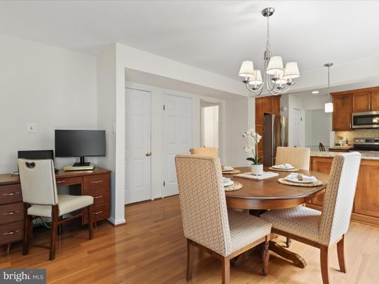 Chandelier, Dining room, Interior, Kitchen, Pendant Lights, Recessed Lighting, Stainless Steel Appliances, Wood Texture Flooring