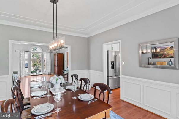 Chandelier, Dining room, Interior, Kitchen, Pendant Lights, Stainless Steel Appliances, Wood Texture Flooring