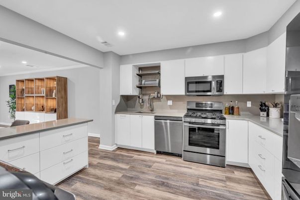 Interior, Kitchen, Recessed Lighting, Stainless Steel Appliances, Wood Texture Flooring
