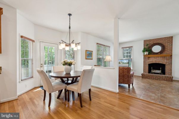 Dining room, Fireplace, Interior, Pendant Lights, Stone Walls, Wood Texture Flooring