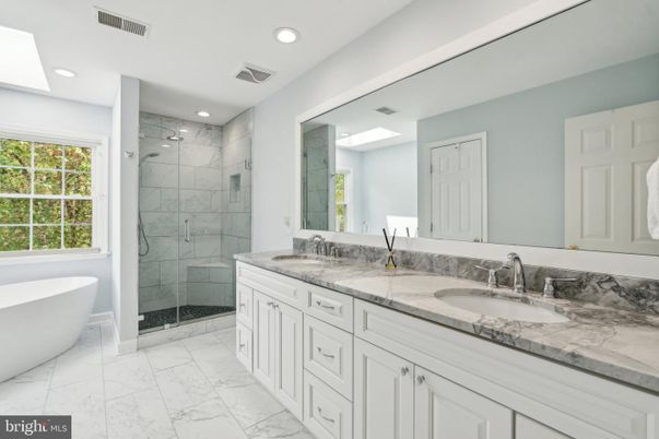 Bathroom, Dual Sink Vanities, Free Standing Baths, Glass Shower, Interior, Marble, Marble Walls, Recessed Lighting