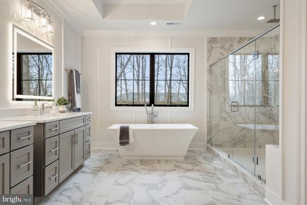 Bathroom, Dual Sink Vanities, Free Standing Baths, Glass Shower, Interior, Marble, Marble Walls, Recessed Lighting