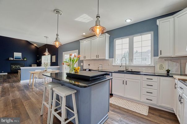 Dining room, Fireplace, Interior, Kitchen, Pendant Lights, Recessed Lighting, Wood Texture Flooring