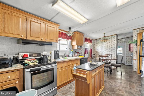 Dining room, Interior, Kitchen, Stainless Steel Appliances, Stone Walls