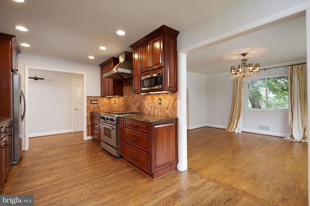 Chandelier, Interior, Kitchen, Recessed Lighting, Stainless Steel Appliances, Wood Texture Flooring