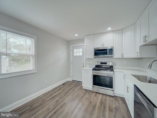 Interior, Kitchen, Recessed Lighting, Stainless Steel Appliances, Wood Texture Flooring