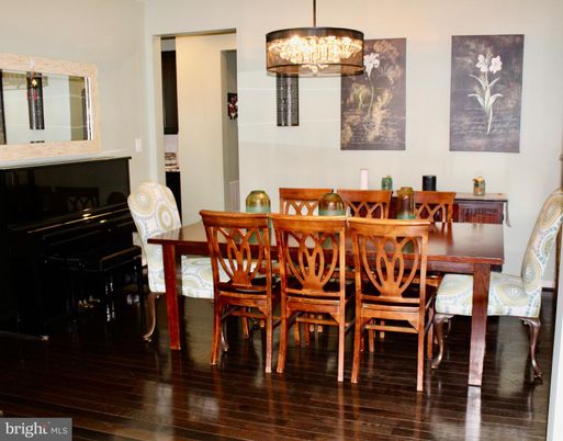 Dining room, Interior, Pendant Lights, Piano, Wood Texture Flooring