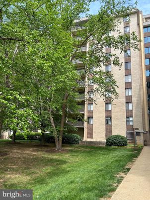 Exterior, Facade, Brick Facade, Condo Building