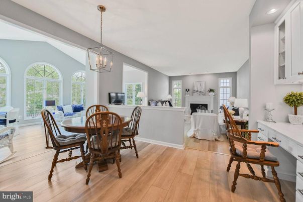 Dining room, Fireplace, Interior, Living room, Pendant Lights, Recessed Lighting, Wood Texture Flooring