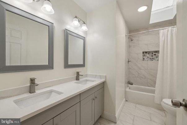 Bathroom, Dual Sink Vanities, Interior, Marble, Marble Walls, Recessed Lighting