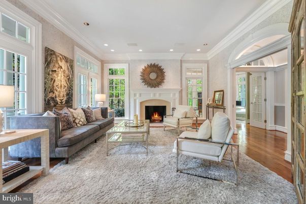 Fireplace, Interior, Living room, Recessed Lighting, Stone Walls, Wood Texture Flooring
