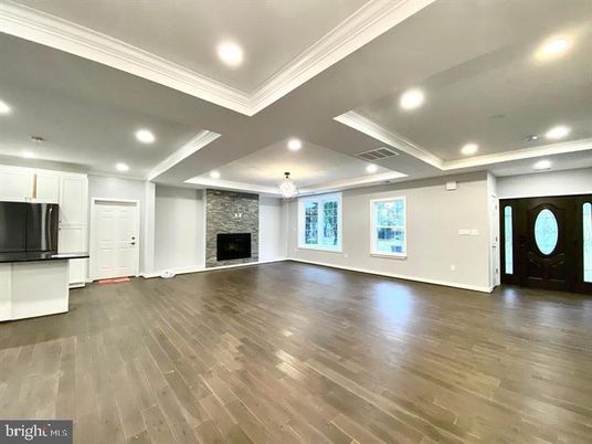 Empty room, Fireplace, Interior, Kitchen, Recessed Lighting, Wood Texture Flooring