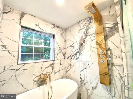 Bathroom, Free Standing Baths, Interior, Marble Walls, Recessed Lighting