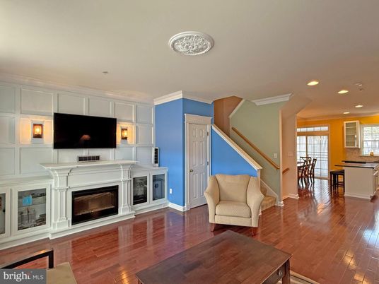 Dining room, Fireplace, Interior, Kitchen, Recessed Lighting, Wood Texture Flooring