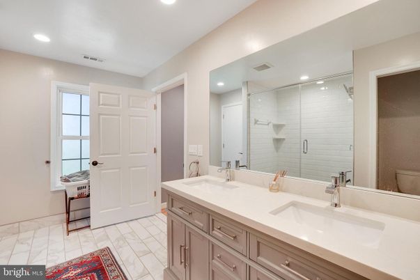 Bathroom, Dual Sink Vanities, Glass Shower, Interior, Marble, Recessed Lighting