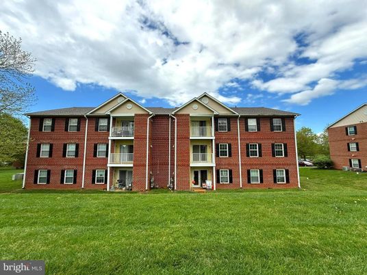 Exterior, Facade, Brick Facade, Condo Building