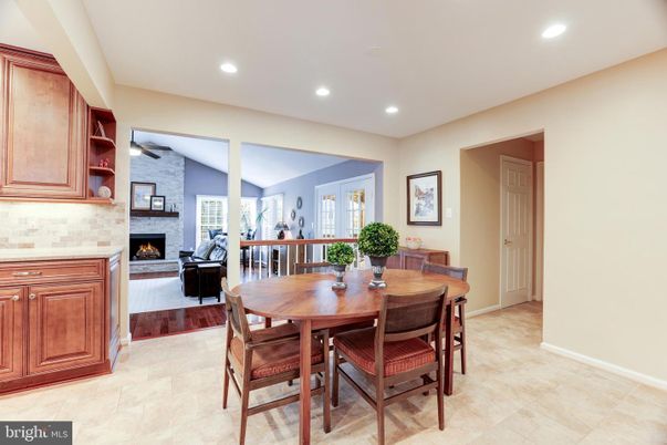 Dining room, Fireplace, Interior, Living room, Recessed Lighting, Stone Walls