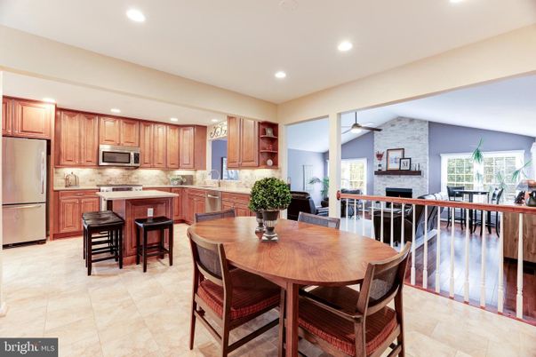 Dining room, Fireplace, Interior, Kitchen, Recessed Lighting, Stainless Steel Appliances, Stone Walls