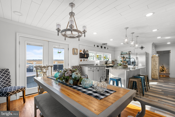 Chandelier, Dining room, Interior, Kitchen, Pendant Lights, Recessed Lighting, Stainless Steel Appliances, Wood Texture Flooring