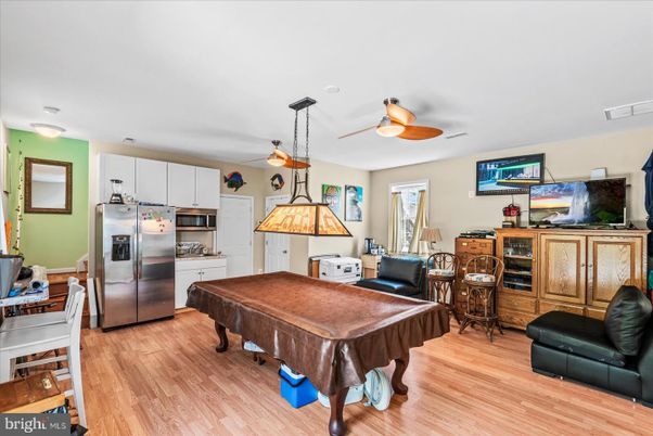Billiard Table, Game Room, Interior, Kitchen, Stainless Steel Appliances, Wood Texture Flooring