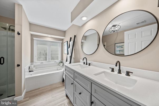 Bathroom, Dual Sink Vanities, Interior, Recessed Lighting, Wood Texture Flooring