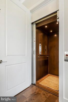 Elevator, Interior, Recessed Lighting, Wooden Ceilings, Wood Texture Flooring, Wooden Walls
