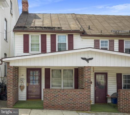 Exterior, Facade, Brick Facade, Cape Cod