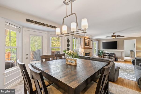 Dining room, Fireplace, Interior, Living room, Pendant Lights, Wood Texture Flooring