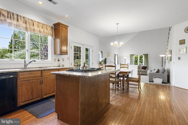 Chandelier, Dining room, Interior, Kitchen, Living room, Recessed Lighting, Wood Texture Flooring