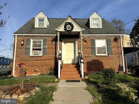 Exterior, Facade, Brick Facade, Cape Cod