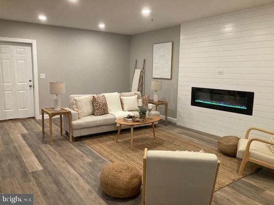 Fireplace, Interior, Living room, Recessed Lighting, Wood Texture Flooring