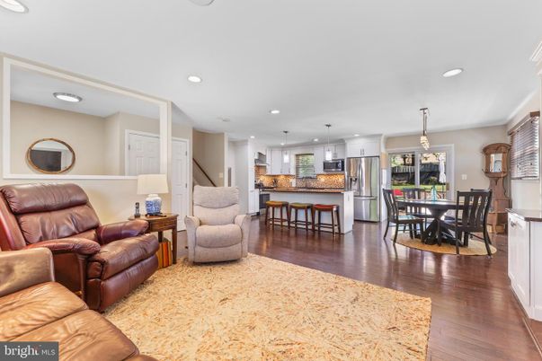 Dining room, Interior, Kitchen, Living room, Pendant Lights, Recessed Lighting, Stainless Steel Appliances, Wood Texture Flooring