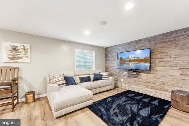 Interior, Living room, Recessed Lighting, Stone Walls, Wood Texture Flooring