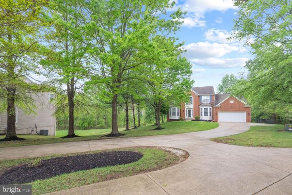 Attached, Backyard, Exterior, Facade, Brick Facade, French Provincial