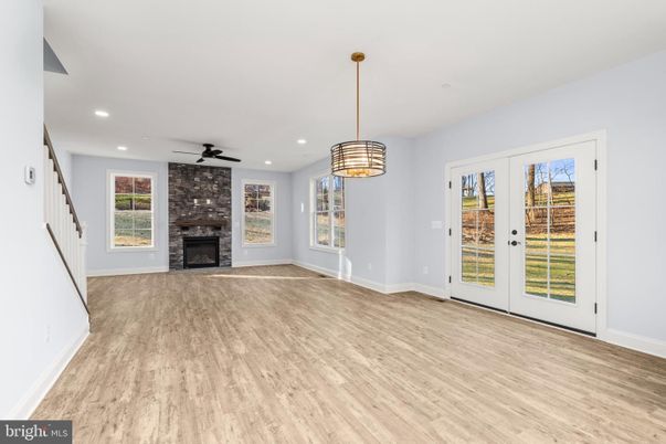 Empty room, Fireplace, Interior, Pendant Lights, Recessed Lighting, Wood Texture Flooring